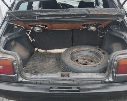 Серый Тойота Королла, объемом двигателя 1.3 л и пробегом 380 тыс. км за 1184 $, фото 4 на Automoto.ua