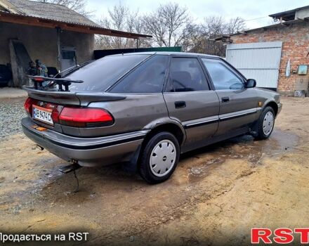 Сірий Тойота Королла, об'ємом двигуна 1.3 л та пробігом 236 тис. км за 900 $, фото 1 на Automoto.ua