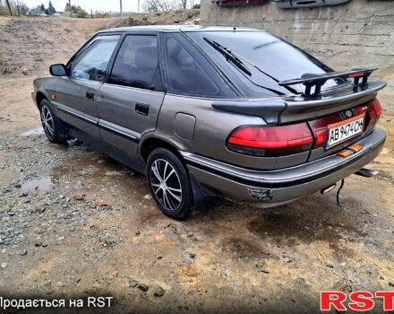 Сірий Тойота Королла, об'ємом двигуна 1.3 л та пробігом 236 тис. км за 900 $, фото 3 на Automoto.ua