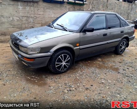 Сірий Тойота Королла, об'ємом двигуна 1.3 л та пробігом 236 тис. км за 900 $, фото 2 на Automoto.ua