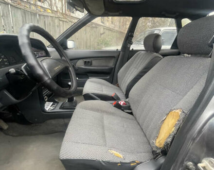 Серый Тойота Королла, объемом двигателя 1.84 л и пробегом 328 тыс. км за 1800 $, фото 11 на Automoto.ua