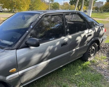 Серый Тойота Королла, объемом двигателя 1.3 л и пробегом 350 тыс. км за 1750 $, фото 3 на Automoto.ua