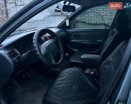 Серый Тойота Королла, объемом двигателя 1.33 л и пробегом 308 тыс. км за 1900 $, фото 10 на Automoto.ua