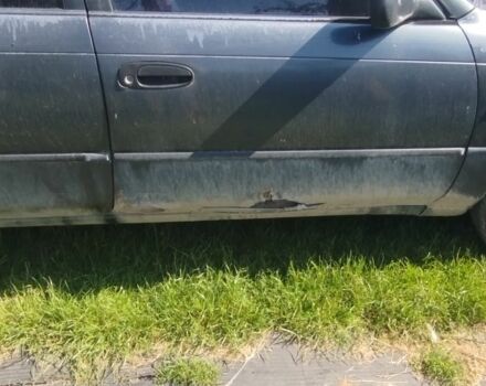 Серый Тойота Королла, объемом двигателя 1.3 л и пробегом 260 тыс. км за 846 $, фото 2 на Automoto.ua