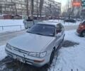 Серый Тойота Королла, объемом двигателя 1.3 л и пробегом 433 тыс. км за 1999 $, фото 1 на Automoto.ua