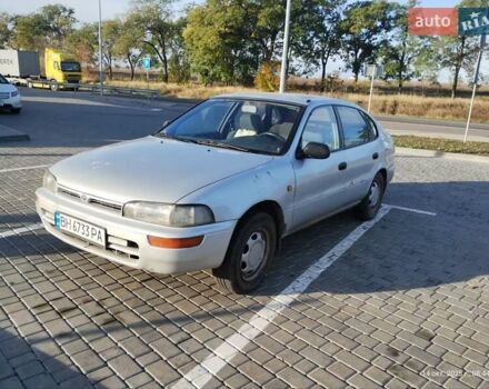 Серый Тойота Королла, объемом двигателя 1.33 л и пробегом 398 тыс. км за 1999 $, фото 1 на Automoto.ua