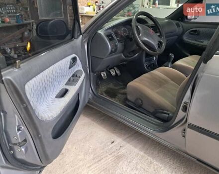 Сірий Тойота Королла, об'ємом двигуна 1.33 л та пробігом 375 тис. км за 1650 $, фото 12 на Automoto.ua