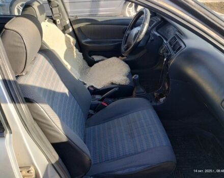 Серый Тойота Королла, объемом двигателя 1.3 л и пробегом 398 тыс. км за 1900 $, фото 9 на Automoto.ua