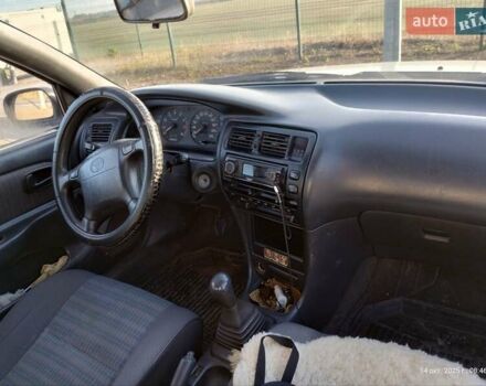 Серый Тойота Королла, объемом двигателя 1.33 л и пробегом 398 тыс. км за 1999 $, фото 8 на Automoto.ua