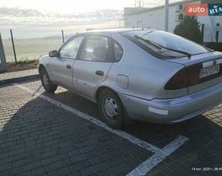 Серый Тойота Королла, объемом двигателя 1.33 л и пробегом 398 тыс. км за 1999 $, фото 4 на Automoto.ua