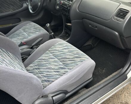 Серый Тойота Королла, объемом двигателя 1.3 л и пробегом 300 тыс. км за 3200 $, фото 9 на Automoto.ua