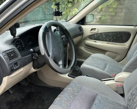 Серый Тойота Королла, объемом двигателя 1.6 л и пробегом 277 тыс. км за 3100 $, фото 4 на Automoto.ua