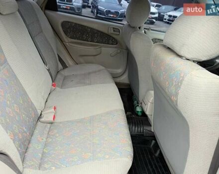 Серый Тойота Королла, объемом двигателя 1.33 л и пробегом 70 тыс. км за 2800 $, фото 14 на Automoto.ua