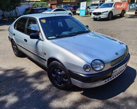 Серый Тойота Королла, объемом двигателя 1.59 л и пробегом 265 тыс. км за 3750 $, фото 1 на Automoto.ua