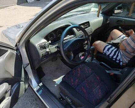 Серый Тойота Королла, объемом двигателя 1.59 л и пробегом 265 тыс. км за 3750 $, фото 6 на Automoto.ua