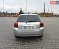 Сірий Тойота Королла, об'ємом двигуна 2 л та пробігом 290 тис. км за 4200 $, фото 4 на Automoto.ua
