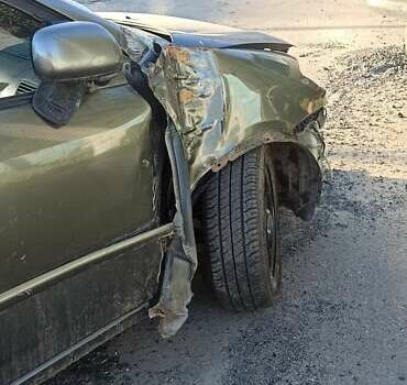 Серый Тойота Королла, объемом двигателя 2 л и пробегом 392 тыс. км за 2100 $, фото 9 на Automoto.ua