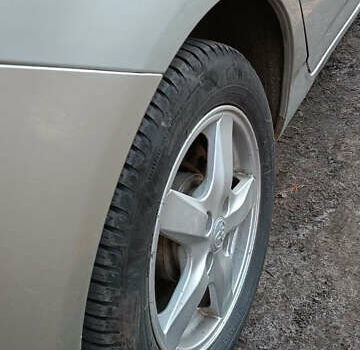 Сірий Тойота Королла, об'ємом двигуна 1.4 л та пробігом 150 тис. км за 6000 $, фото 4 на Automoto.ua