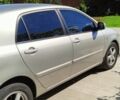 Сірий Тойота Королла, об'ємом двигуна 1.6 л та пробігом 243 тис. км за 6800 $, фото 2 на Automoto.ua