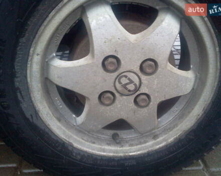 Серый Тойота Королла, объемом двигателя 1.3 л и пробегом 265 тыс. км за 1500 $, фото 2 на Automoto.ua