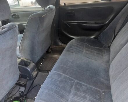 Серый Тойота Королла, объемом двигателя 1.4 л и пробегом 200 тыс. км за 1100 $, фото 1 на Automoto.ua