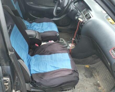 Серый Тойота Королла, объемом двигателя 1.3 л и пробегом 250 тыс. км за 500 $, фото 5 на Automoto.ua