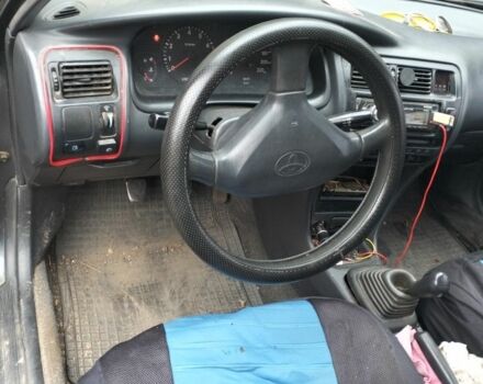 Серый Тойота Королла, объемом двигателя 1.3 л и пробегом 250 тыс. км за 500 $, фото 4 на Automoto.ua