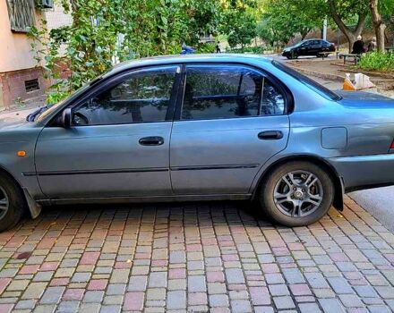 Серый Тойота Королла, объемом двигателя 1.3 л и пробегом 240 тыс. км за 2500 $, фото 1 на Automoto.ua