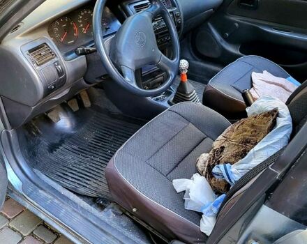 Серый Тойота Королла, объемом двигателя 1.3 л и пробегом 240 тыс. км за 2500 $, фото 2 на Automoto.ua