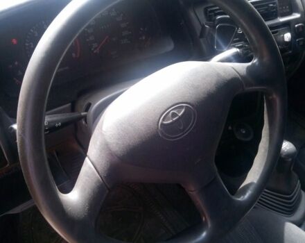 Серый Тойота Королла, объемом двигателя 1.3 л и пробегом 280 тыс. км за 2000 $, фото 5 на Automoto.ua