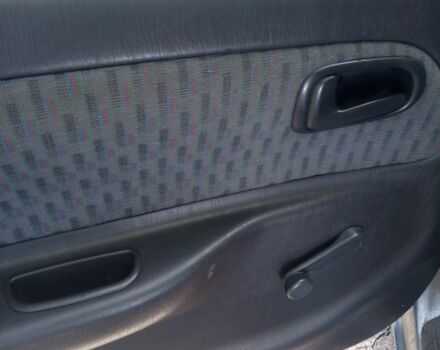 Серый Тойота Королла, объемом двигателя 1.3 л и пробегом 280 тыс. км за 2000 $, фото 6 на Automoto.ua