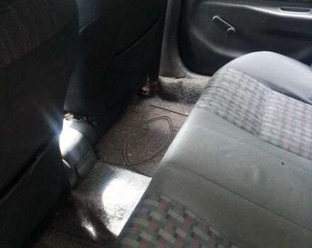 Серый Тойота Королла, объемом двигателя 1.3 л и пробегом 280 тыс. км за 2000 $, фото 8 на Automoto.ua