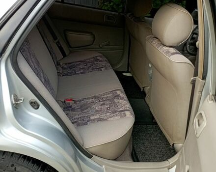 Серый Тойота Королла, объемом двигателя 1.4 л и пробегом 200 тыс. км за 1950 $, фото 4 на Automoto.ua