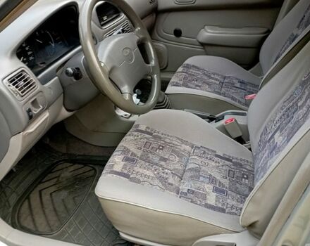 Серый Тойота Королла, объемом двигателя 1.4 л и пробегом 200 тыс. км за 1950 $, фото 7 на Automoto.ua