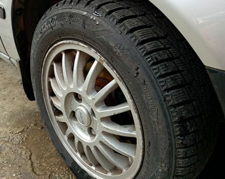 Серый Тойота Королла, объемом двигателя 1.4 л и пробегом 200 тыс. км за 1950 $, фото 1 на Automoto.ua