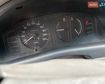 Серый Тойота Королла, объемом двигателя 1.4 л и пробегом 388 тыс. км за 2700 $, фото 4 на Automoto.ua