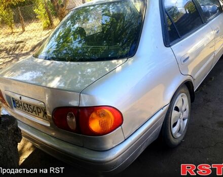 Серый Тойота Королла, объемом двигателя 1.6 л и пробегом 300 тыс. км за 1200 $, фото 1 на Automoto.ua