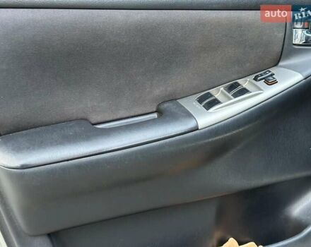 Сірий Тойота Королла, об'ємом двигуна 1.6 л та пробігом 245 тис. км за 5490 $, фото 10 на Automoto.ua