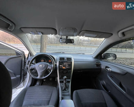 Сірий Тойота Королла, об'ємом двигуна 1.6 л та пробігом 247 тис. км за 7800 $, фото 9 на Automoto.ua