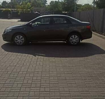 Сірий Тойота Королла, об'ємом двигуна 1.6 л та пробігом 263 тис. км за 6900 $, фото 4 на Automoto.ua