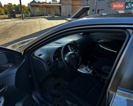 Сірий Тойота Королла, об'ємом двигуна 1.6 л та пробігом 257 тис. км за 5850 $, фото 7 на Automoto.ua