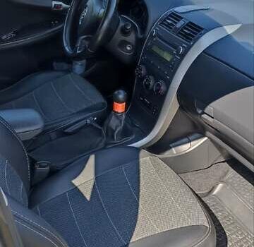 Серый Тойота Королла, объемом двигателя 1.6 л и пробегом 142 тыс. км за 7000 $, фото 3 на Automoto.ua