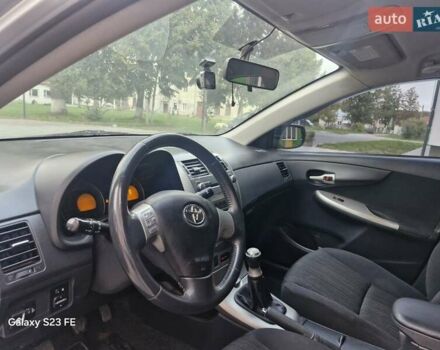 Сірий Тойота Королла, об'ємом двигуна 1.6 л та пробігом 170 тис. км за 7299 $, фото 18 на Automoto.ua