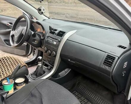 Сірий Тойота Королла, об'ємом двигуна 1.33 л та пробігом 247 тис. км за 7100 $, фото 7 на Automoto.ua