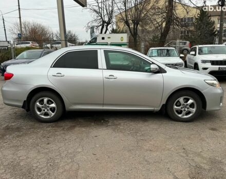 Сірий Тойота Королла, об'ємом двигуна 1.3 л та пробігом 137 тис. км за 7490 $, фото 3 на Automoto.ua