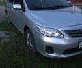 Сірий Тойота Королла, об'ємом двигуна 1.33 л та пробігом 113 тис. км за 8600 $, фото 1 на Automoto.ua