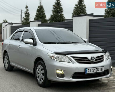 Сірий Тойота Королла, об'ємом двигуна 1.33 л та пробігом 138 тис. км за 7650 $, фото 1 на Automoto.ua