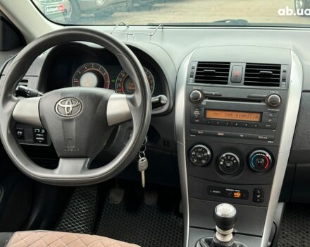 Сірий Тойота Королла, об'ємом двигуна 1.3 л та пробігом 137 тис. км за 7490 $, фото 20 на Automoto.ua