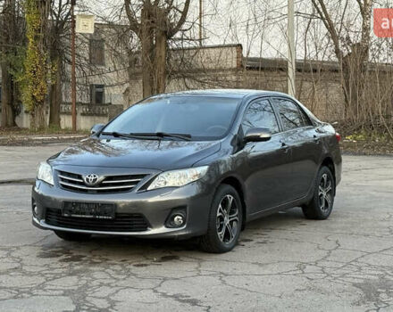 Сірий Тойота Королла, об'ємом двигуна 1.6 л та пробігом 83 тис. км за 10700 $, фото 1 на Automoto.ua