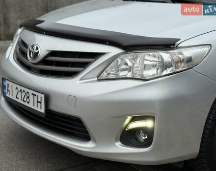 Сірий Тойота Королла, об'ємом двигуна 1.33 л та пробігом 138 тис. км за 7650 $, фото 2 на Automoto.ua